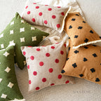 Embroidered Playful Motif Cushion